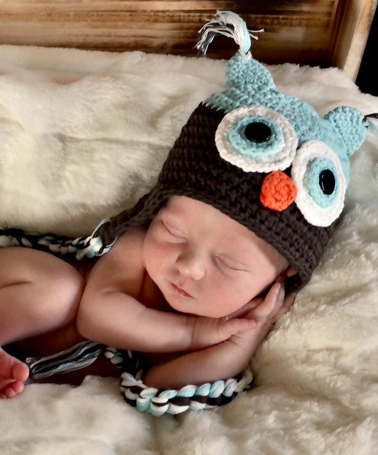 Brown and blue crocheted owl hat